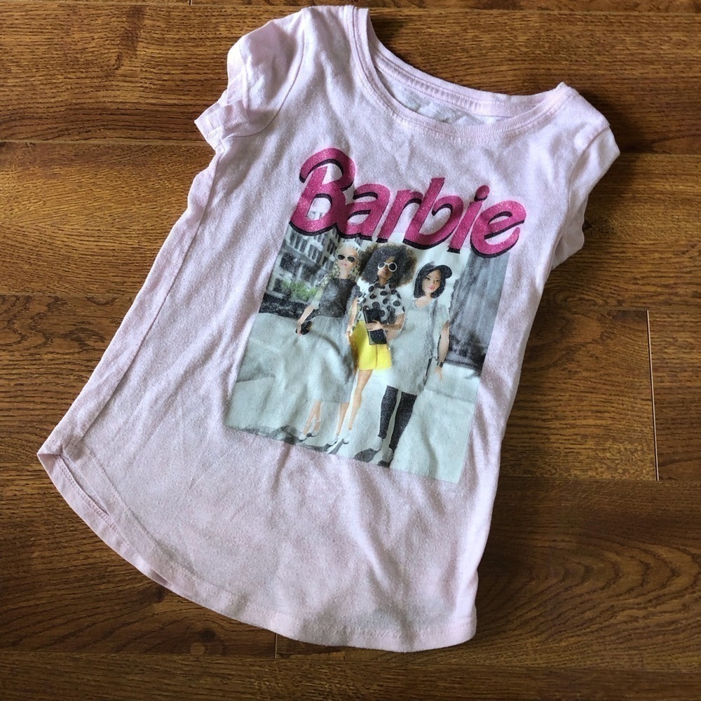 Barbie pink cap sleeve graphic tee shirt is in size S